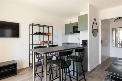 Cuisine ou kitchenette dans l'établissement L'élégant - Desaugiers