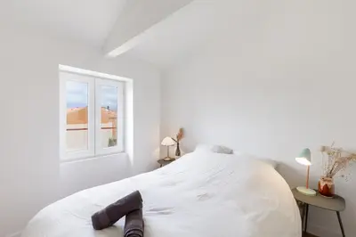 Un ou plusieurs lits dans un hébergement de l'établissement Appartement climatisé 2 chambres