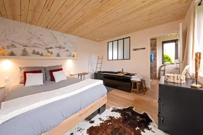 Un ou plusieurs lits dans un hébergement de l'établissement Suite Chalet K - Hyper Centre- Gare