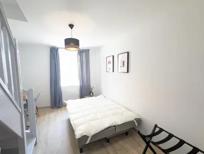 Un ou plusieurs lits dans un hébergement de l'établissement Le PRESTIGE 152 proche aéroport -gare Lyon -groupama stadium-ldlc arena