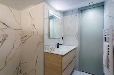 Salle de bains dans l'établissement Suite Romantique Balnéo Centre Lyon