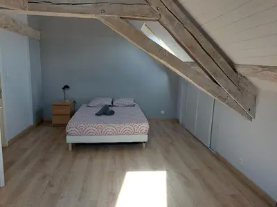 Un ou plusieurs lits dans un hébergement de l'établissement MONTALIEU SEJOUR Duplex Tournesol, prox CNPE Bugey, PIPA, vallée Bleue