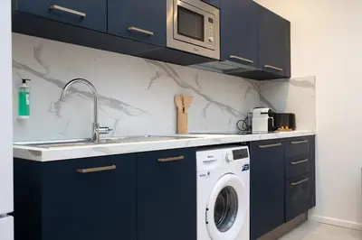 Cuisine ou kitchenette dans l'établissement Loft MEHARI - Le Méridien #Parking #Lave-linge #Clim #Netflix