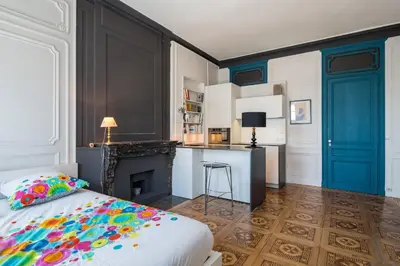 Un ou plusieurs lits dans un hébergement de l'établissement Le Trompettiste - Newly refurbished flat