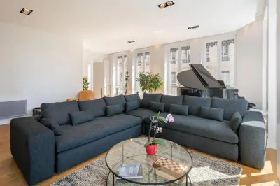 Coin salon dans l'établissement Le Trompettiste - Newly refurbished flat