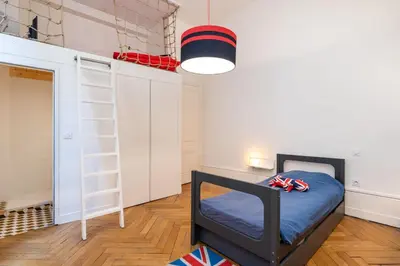 Un ou plusieurs lits dans un hébergement de l'établissement Les balcons de Fourvière - Apartment with view
