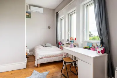 Un ou plusieurs lits dans un hébergement de l'établissement La Verrière amazing familiy house