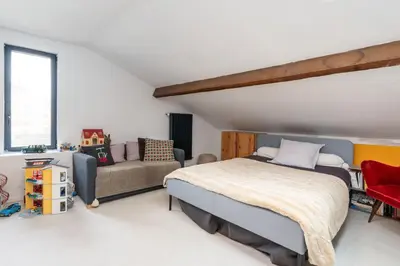 Un ou plusieurs lits dans un hébergement de l'établissement Le Marronnier - charming house with swimming pool
