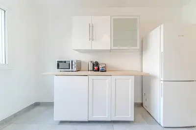 Cuisine ou kitchenette dans l'établissement Le Jardin d’Alexandre cosy 4 pers Charpennes