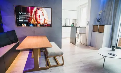 Télévision ou salle de divertissement dans l'établissement Blue King Suite - Triangle d'Or