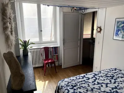 Un ou plusieurs lits dans un hébergement de l'établissement Beau T3 Canut lumineux de 75m2