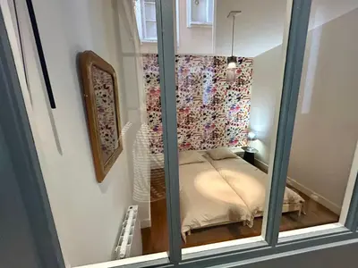 Un ou plusieurs lits dans un hébergement de l'établissement Appartement de caractère 6 pers - hyper centre de Lyon