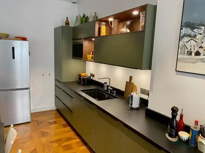 Cuisine ou kitchenette dans l'établissement Appartement de caractère 6 pers - hyper centre de Lyon