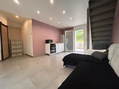 Cuisine ou kitchenette dans l'établissement Magnifique appartement avec jardin et terrasse