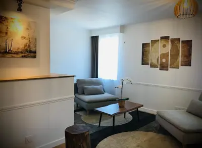 Coin salon dans l'établissement Suite Spa et Sauna de Cogny