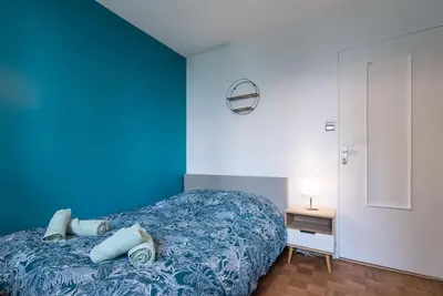 Un ou plusieurs lits dans un hébergement de l'établissement Appartement rénové pour 6 avec parking