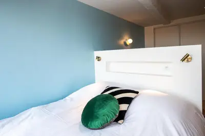 Un ou plusieurs lits dans un hébergement de l'établissement Valencio - Un belvédère sur le Vieux Lyon