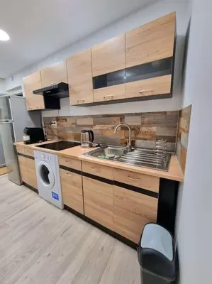 Cuisine ou kitchenette dans l'établissement Appartement Neuf Rénové