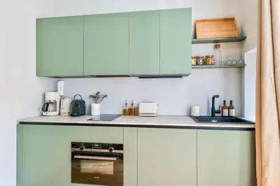 Cuisine ou kitchenette dans l'établissement NOCNOC Le Porthos