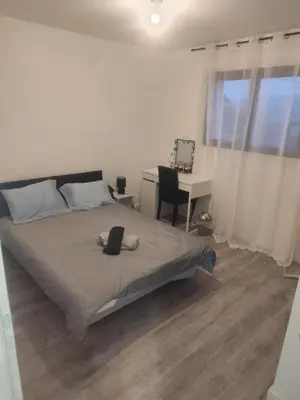 Un ou plusieurs lits dans un hébergement de l'établissement Chambre spacieuse #1