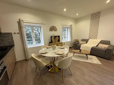 Coin salon dans l'établissement Joli Appartement Saint-germain