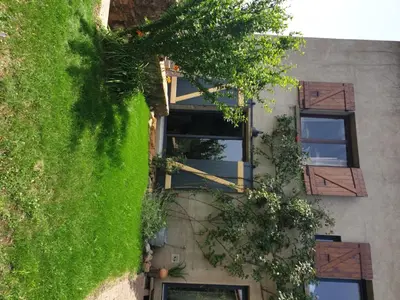 Jardin de l'établissement Charmante maison de famille près de Lyon