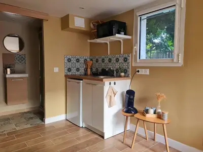 Cuisine ou kitchenette dans l'établissement Le Gallieni