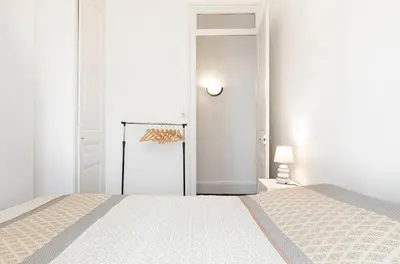 Un ou plusieurs lits dans un hébergement de l'établissement appartement 2 pièces Jean Macé et stationnement
