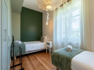 Un ou plusieurs lits dans un hébergement de l'établissement Cottage de Montchamp