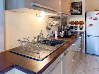 Cuisine ou kitchenette dans l'établissement Appartement T2 avec jardin et parking