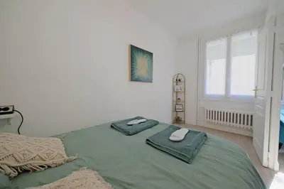 Un ou plusieurs lits dans un hébergement de l'établissement Appartement COSY Gare Chateaucreux