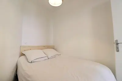 Un ou plusieurs lits dans un hébergement de l'établissement Le Charpennes - Beautiful T1 Apartment - Villeurbanne