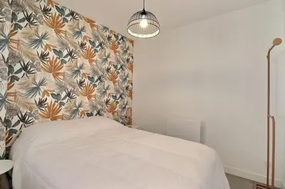 Un ou plusieurs lits dans un hébergement de l'établissement Les Mimosas - T2 Ground Floor Apartment - Villeurbanne