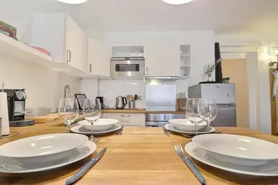 Cuisine ou kitchenette dans l'établissement Le Marius - Beautiful apartment near the Rhône - Lyon 3rd