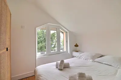 Un ou plusieurs lits dans un hébergement de l'établissement Le Zanzibar - Lovely Bright Apartment - Villeurbanne
