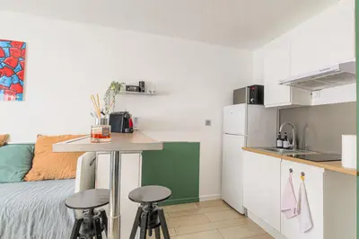 Cuisine ou kitchenette dans l'établissement Le Florence - Studio Grange Blanche