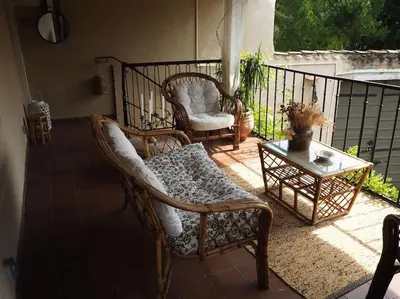 Balcon ou terrasse dans l'établissement Charmante Grange aux Monts d'Or