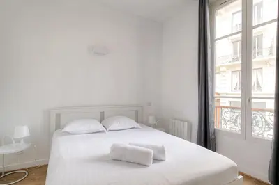 Un ou plusieurs lits dans un hébergement de l'établissement Appartement cosy rénové, Hyper-centre Lyon