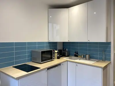 Cuisine ou kitchenette dans l'établissement Le Saint-Georges, BNBConciergerie