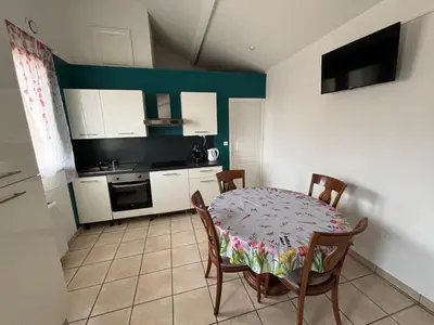 Cuisine ou kitchenette dans l'établissement Evasion