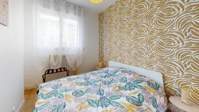 Un ou plusieurs lits dans un hébergement de l'établissement Le Cour Vitton - Lyon 6ème - Proche Parc Tête d'Or