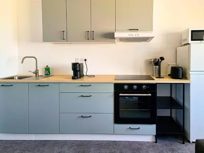 Cuisine ou kitchenette dans l'établissement La Gaufrette