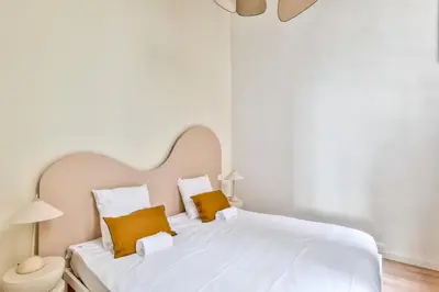 Un ou plusieurs lits dans un hébergement de l'établissement NOCNOC Le Boudoir