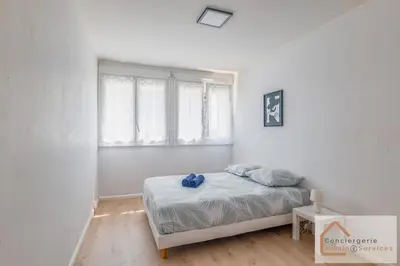 Un ou plusieurs lits dans un hébergement de l'établissement La Belle Escale - appartement lumineux à proximité d'Eurexpo