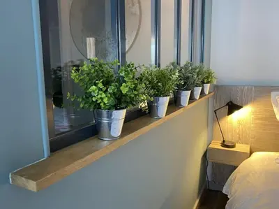 Un ou plusieurs lits dans un hébergement de l'établissement Studio lumineux avec balcon proche Tête d'Or