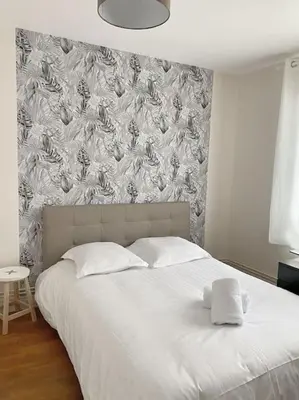 Un ou plusieurs lits dans un hébergement de l'établissement Appartement T4 charmant bien situé, Charpennes