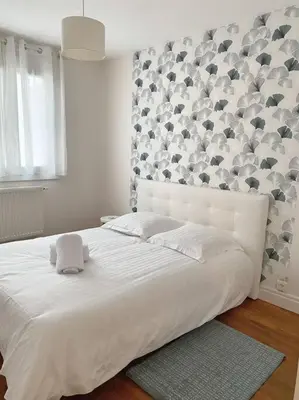Un ou plusieurs lits dans un hébergement de l'établissement Appartement T4 charmant bien situé, Charpennes