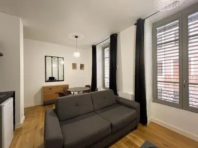 Coin salon dans l'établissement Studio chaleureux, proche gare, Lyon 3