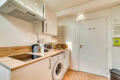 Cuisine ou kitchenette dans l'établissement Le Nid Blanc - Agréable studio tout équipé