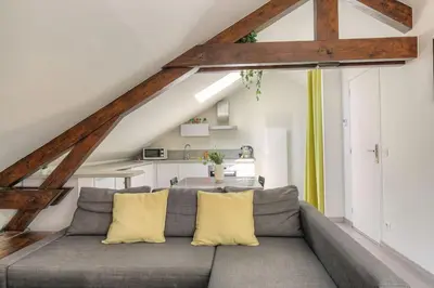 Coin salon dans l'établissement Loft charmant dans maison de ville, Villeurbanne
